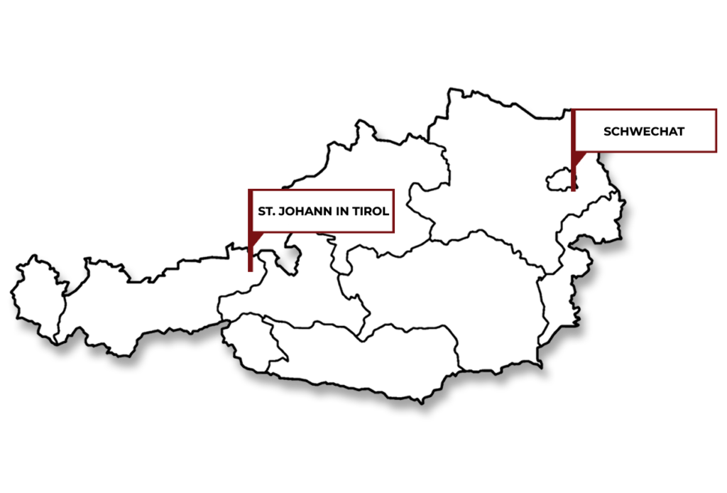 Umrisse von Österreich welche die Standorte Schwechat & St. Johann in Tirol zeigt